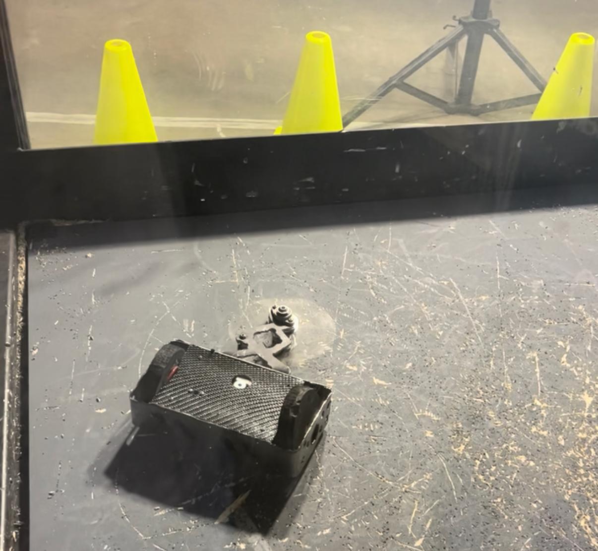 Mudslide robot in a cage